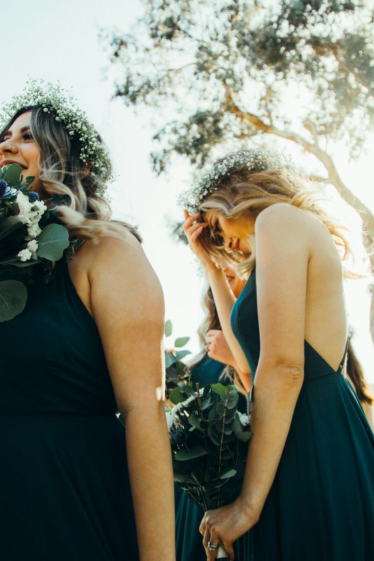 Bridesmaids laughing together outdoors